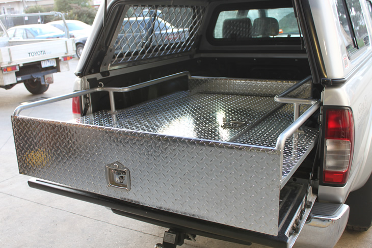 slide out tool box in back of ute in extended position